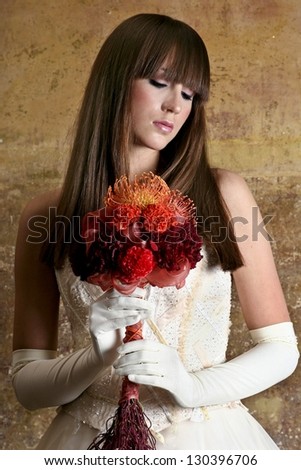 Beautiful bride with huge bouquet of colorful flowers