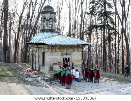 KALWARIA ZEBRZYDOWSKA - APRIL 04: Celebration of Holy Saturday. Soldiers in period costumes in front od Jesus tomb waiting for Resurrection ceremony. Kalwaria Zebrzydowska, Poland on April 04, 2010.