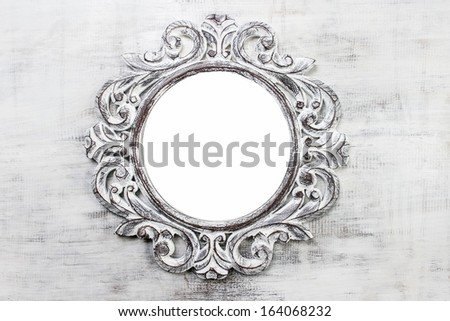 Rustic wooden round frame on grey background. Copy space, your text here