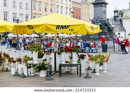 KRAKOW, POLAND - SEPTEMBER 02,2014: Street stall with flowers at the Main Market Square, Krakow, Poland.