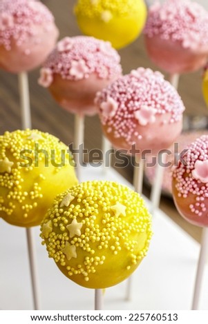 Yellow and pink cake pops