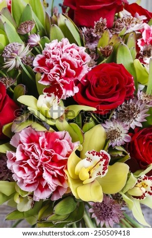 Bouquet of orchid, rose and carnation flowers