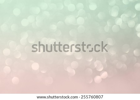 Mint and pink glittering background.