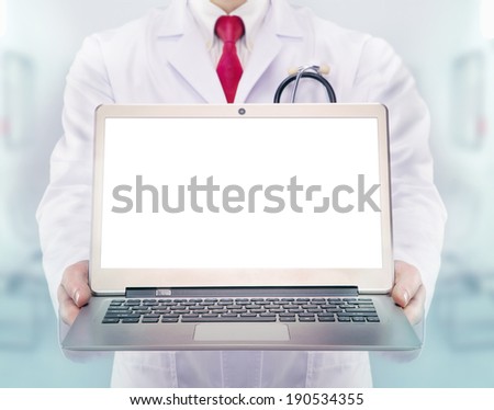 Doctor with stethoscope and laptop in a hospital
