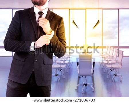 Hipster business man  on blurred background office. High resolution.