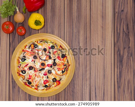 Mock up template pizza on a wooden table.  High resolution.