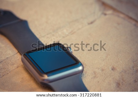 Smart watch on stone background. Mockup