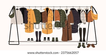 Winter clothes on racks. Men and women fashionable outfits for autumn and spring, trendy fashionable store with variety of accessories. Vector cartoon illustration. Coats, boots and sneakers