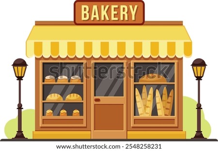 Small business bakery shop building facade with bread, cakes and baguettes displayed in the window, yellow awning and street lamps