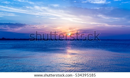 Similar – Image, Stock Photo Intense sunset at the coast of Reykjavik, Iceland