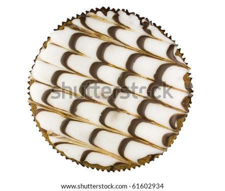 Fancy cake with curvy icing, top view, isolated on white.