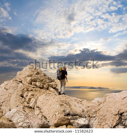man in meditation on top of the mountain