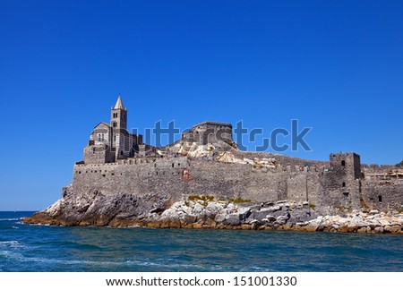 View of the Church of Saint Peter (circa 1198) from the Gulf of Poets. Portovenere town (UNESCO world heritage site), Liguria, Italy