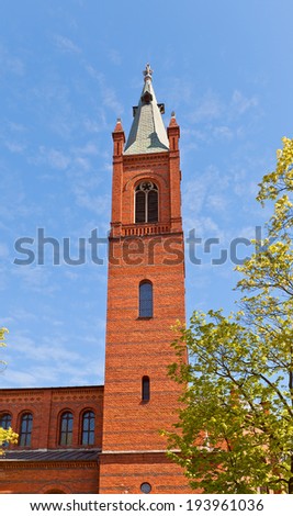 Belfry of Church of Holy Trinity (circa 1886) in Kwidzyn (former Marienwerder) town, Pomeranian Voivodeship, Poland. Belongs to catholic Order of Friars Minor