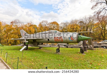 WARSAW, POLAND - OCTOBER 20, 2014:  Soviet supersonic jet fighter aircraft MiG-21 (NATO name Fishbed) in Museum of Polish Army in Warsaw, Poland. The most-produced supersonic jet aircraft in history