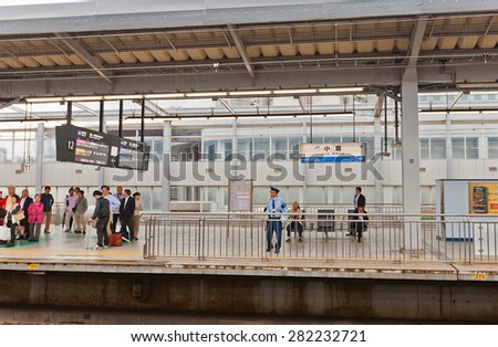 KOKURA, JAPAN - MAY 18, 2015: Platform of Kokura railway terminal in Kitakyushu town, Japan. The second largest station in Kyushu Island with 120,000 users daily