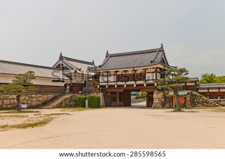 HIROSHIMA, JAPAN - MAY 20, 2015: Tamon Yagura turret and Ninomaru Omote gate of Hiroshima Castle in Hiroshima, Japan. National historic site, erected in 1591, destroyed in 1945, reconstructed in 1958