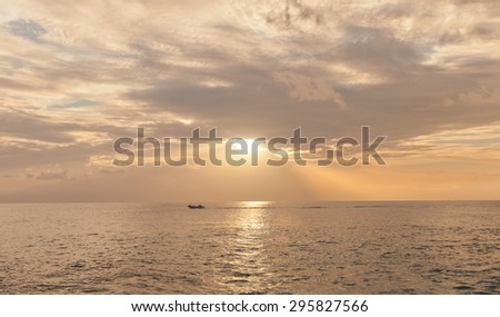 Summer sunset on the Caribbean seashore of Grand Cayman Island, Cayman Islands, British Overseas Territory