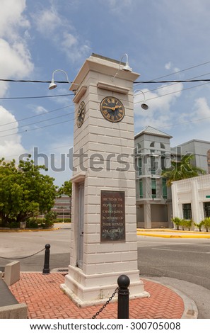 GEORGE TOWN, CAYMAN ISLANDS - JULY 05, 2015: Clock tower in George Town of Grand Cayman, Cayman Islands (British Overseas Territory). Erected in 1937 in memory of King George V