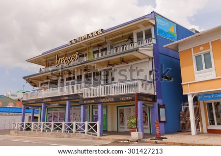 GEORGE TOWN, CAYMAN ISLANDS - JULY 05, 2015: Colonial style house in George Town of Grand Cayman, Cayman Islands (British Overseas Territory). Hosts Landmark duty free jewelry shop and Breezes cafe