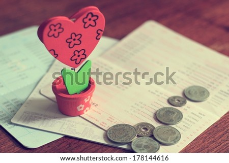 Business concept of  loan with book bank statement in vintage style on wooden background