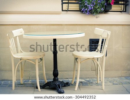 Round table and two chairs