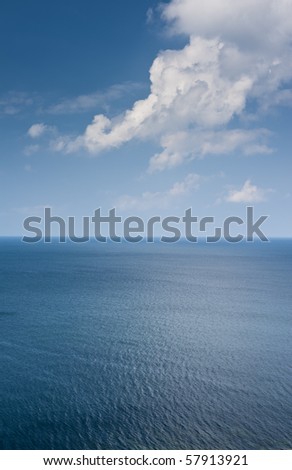 ocean blue horizon with cloud vertical