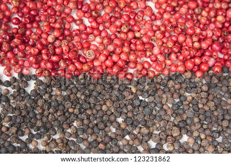 Black and rose pepper on a table