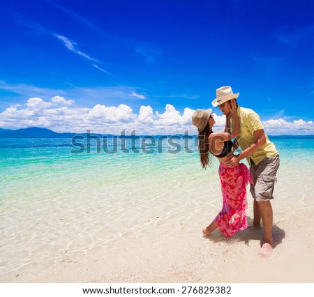 beautiful sexy woman and man with sunglasses in beach, bikini, hat, blue sun sea tropical nature background luxury  resort island about coral reef, tan sport athletic body, people holiday