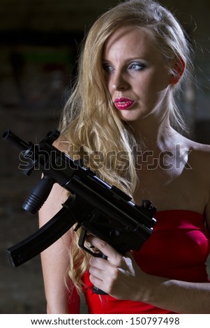 Female Spy in red dress with automatic gun