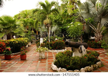 Garden view with trees,  patio  in summer resort (Tolu,Colombia)