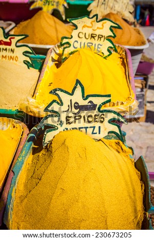 Beautiful vivid oriental market with baskets full of various spices