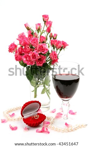 Pink roses and wine