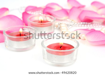 Petals of roses and candles