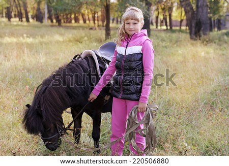 the girl and the little pony