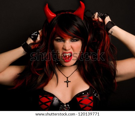 Sexy Woman Dressed in Devil Outfit