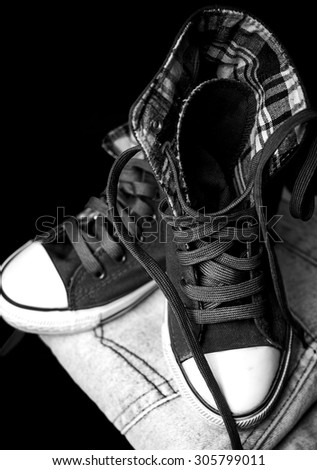 Black and white photo of a stylish sneaker