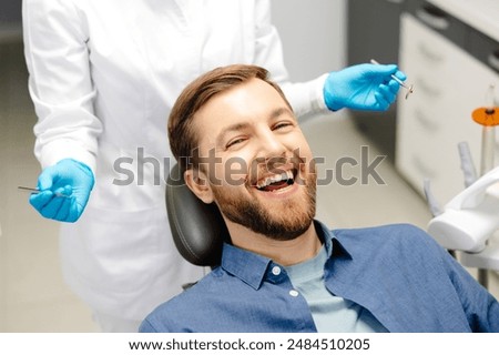 Similar – Image, Stock Photo Crop dentist examining teeth of patient in clinic