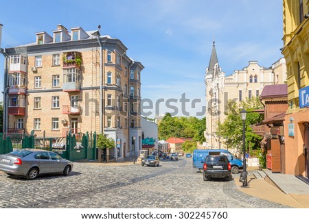 Kiev/Ukraine - July 31, 2015 - Going down in Andriyivskyy Descent in Kiev. The road is covered with antique cobblestones