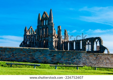 Whitby, North Yorkshire, UK - October 12, 2014: Whitby Abbey in sunny day.Whitby is a seaside town and port in North Yorkshire, UK, famous for Whitby Abbey, the town\'s landmark.