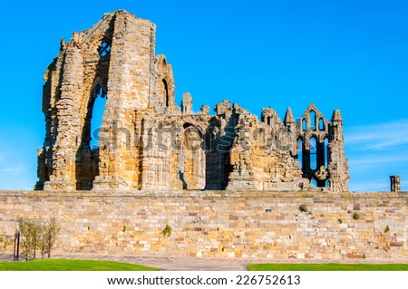 Whitby, North Yorkshire, UK - October 12, 2014: Whitby Abbey in sunny day.Whitby is a seaside town and port in North Yorkshire, UK, famous for Whitby Abbey, the town\'s landmark.