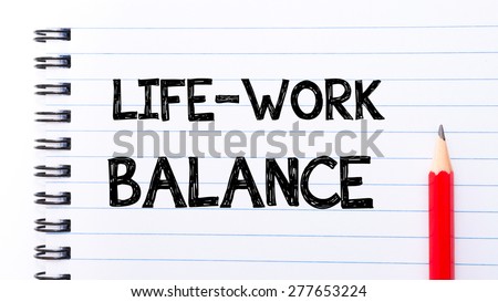 Life Work Balance Text written on notebook page, red pencil on the right. Motivational Concept image