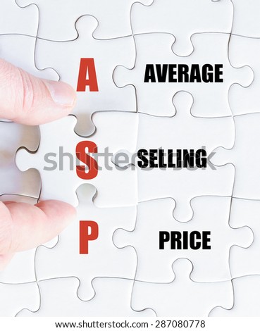Hand of a business man completing the puzzle with the last missing piece.Concept image of Business Acronym ASP as Average Selling Price