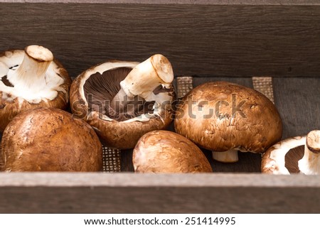 Mushrooms in wooden box