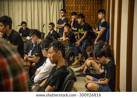EDITORIAL: Students are listening to Prof. Peter Mathieson Dr. Leung Chi Hung, about the appointment of Pro Vice-Chancellor. ?Students Occupying HKU Council Chamber? Taken on 29/07/2015 at Pok Fu Lam.