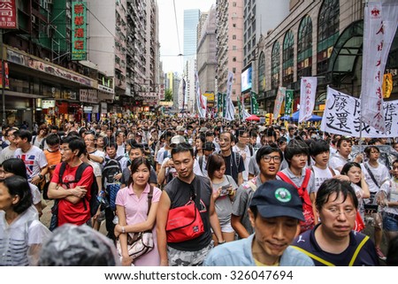 EDITORIAL: July 1st Demonstration happening in Admiralty, Hong Kong, 430,000 people joined the demonstration. Shot in Causeway Bay on 1/7/2013