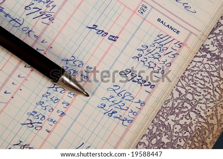 stock-photo-detail-of-a-handwritten-ledger-with-pencil-19588447.jpg