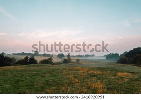 Similar – Image, Stock Photo Field with trees and buildings