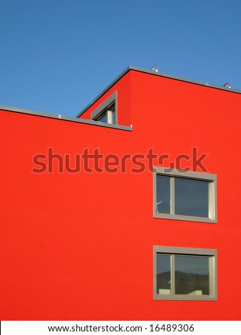 Architecture - Modern red building on a bright blue sky