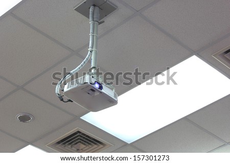 Projector hang on ceiling in the meeting room